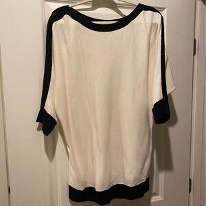 New York & Company Vintage Black & White Knit Top with Peekaboo Sleeve Slits